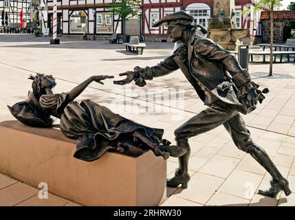 Sleeping Beauty monument on the market square, half-timbered houses in the background, Germany, Hesse, Hofgeismar Stock Photo