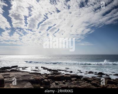 Altocumulus undulatus clouds above the Indian Ocean on the Cape to Cape track north of Gracetown, Leeuwin-Naturaliste National Park, Western Australia Stock Photo