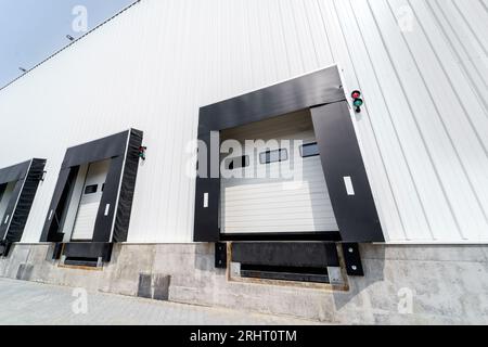 Warehouse gate for loading and unloading cargo in a distributed center Stock Photo