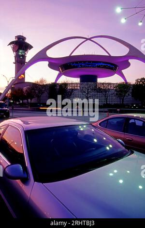 The iconic Theme Building at sunset with colorful lighting at LAX airport in Los Angeles, CA., USA Stock Photo