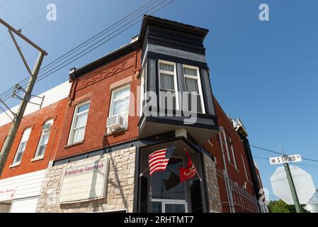 Malta, Illinois - United States - August 15th, 2023: Old building and storefront in downtown Malta, Illinois, USA. Stock Photo