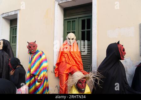 Santo Amaro, Bahia, Brazil - July 23, 2023: People dressed in terror costumes and masks are seen in the streets of Acupe. City of Santo Amaro, in Bahi Stock Photo