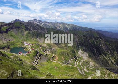 Stunning view from above of the hairpin road leading to Lake Bâlea on the Transfagaras mountain pass in southern Carpathians of Romania. Stock Photo