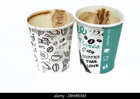 A drunk cup of Turkish coffee in a disposable drinking foam cup isolated on a white background, with text of coffee time and cup of coffee figure, Foa Stock Photo