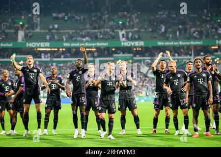 final jubilation M, the players celebrate in front of the fans, left to right Leon GORETZKA (M), Mathys TEL (M), Alphonso DAVIES (M), Benjamin PAVARD (M), Joshua KIMMICH (M), Matthijs DE LIGT (M), Min-Jae KIM (M), Konrad LAIMER (M), Kingsley COMAN (M), Eric Maxim CHOUPO-MOTING (M) Soccer 1st Bundesliga, 1st matchday, SV Werder Bremen (HB) - FC Bayern Munich (M ) 0: 4, on August 18th, 2023 in Bremen/ Germany. #DFL regulations prohibit any use of photographs as image sequences and/or quasi-video # Credit: dpa picture alliance/Alamy Live News Stock Photo