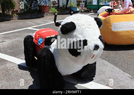 Tokyo May 3 2023: panda car in Tokyo, in Hanayashiki, Hanayashiki is one of oldest amusement park in Japan. Stock Photo