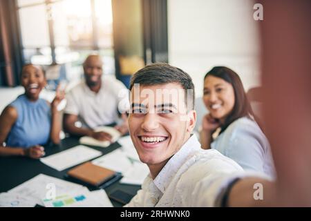 Selfie, portrait or happy businessman in meeting taking photo to post on social media together. Smile, team building or excited employees with Stock Photo