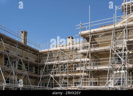 Large scaffolding project on large building neededing  maintenance Stock Photo