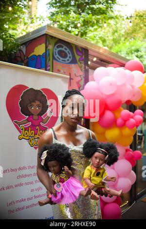 London, UK. 19th Aug 2023. A Kensington mum started her own doll company after not being able to find any dark skin dolls for her daughter in a high street store. Lola Ogundele is the creator of 'Lola Love Dolls' which not only have curly hair, but also feature outfits that reflect African culture. Credit: Kingsley Davis/Alamy Live News Stock Photo