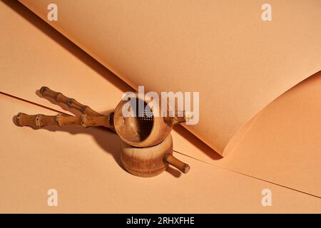 High angle of handmade bamboo tea filters near craft paper background with a beautiful studio Stock Photo