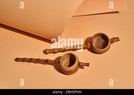 High angle of handmade bamboo tea filters near craft paper background with a beautiful studio Stock Photo