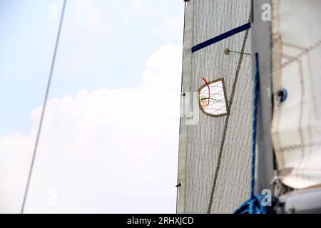 Parts of a sailboat that is sailing on the lake with sails out, bow ...