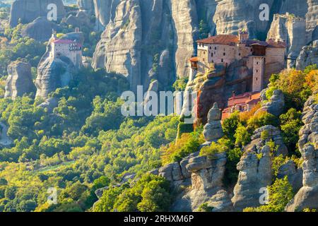 Meteora monasteries. Unique  Panoramic view on the Roussanou Monastery  placed on the edge  of high rock. The Meteora area is on UNESCO World Heritage Stock Photo