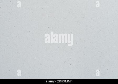 White paper texture with black grain dots macro close up view Stock Photo