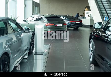 brand new cars parked in Audi car dealership Stock Photo