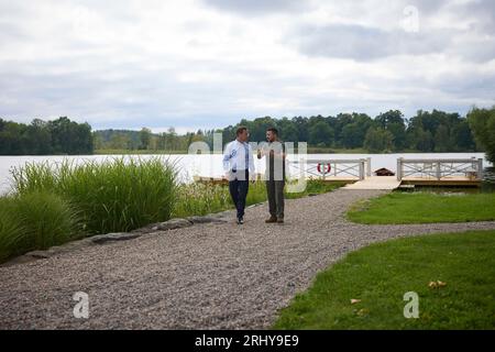 Flen, Sweden. 19th Aug, 2023. Swedish Prime Minister Ulf Kristersson, left, walks with Ukrainian President Volodymyr Zelenskyy, right, during a bilateral meeting at the traditional country of Harpsund, August 19, 203 in Flen, Sweden. Credit: Pool Photo/Ukrainian Presidential Press Office/Alamy Live News Stock Photo