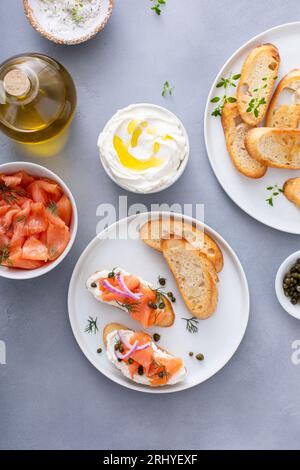 Salmon and cream cheese bruschetta with fresh dill and capers Stock Photo