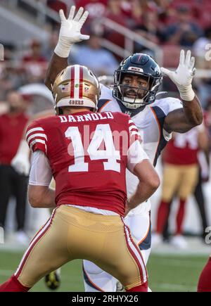 San Francisco 49ers' Sam Darnold, left, and Trey Lance (5) takes part ...