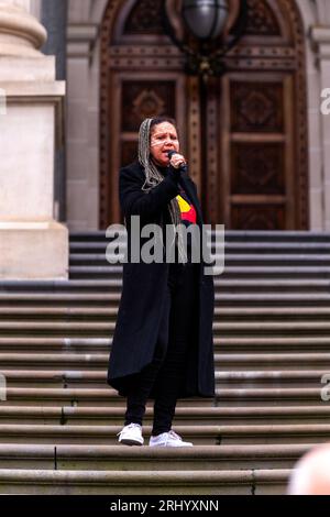 An Indigenous woman speaks to colleagues during a 'No Vote' rally on the steps of State Parliament. The Australian government will hold a referendum to change the constitution to include an indigenous 'voice to parliament'. A small group of around 30 people gathered in Melbourne at one of the first public rallies apposed to the voice. Speakers included indigenous people as well as member of fringe sovereign citizen movements and other fringe groups that emerged during the COVID-19 pandemic and lock-downs. (Photo by Michael Currie/SOPA Images/Sipa USA) Stock Photo