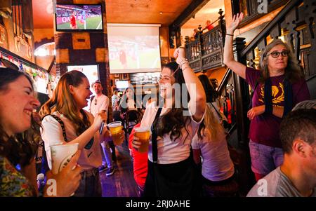 Brighton UK 20th August 2023 - England fans look happy as they gather in the King & Queen pub in Brighton ready to watch  England take on Spain in the Women's World Cup Final in Australia   : Credit Simon Dack / Alamy Live News Stock Photo