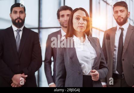 Corporate, teamwork and trust with a man and woman employee group confident in the workplace Stock Photo