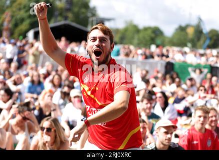 A Spain fan celebrates their side's first goal of the game, scored by Spain's Olga Carmona, during a screening of the FIFA Women's World Cup 2023 final between Spain and England at All Points East festival in Victoria Park, London. Picture date: Sunday August 20, 2023. Stock Photo