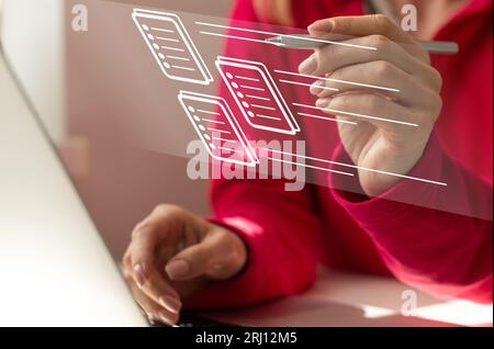 Paperless workplace idea, e-signing, electronic signature, document management. A businesswoman signs an electronic document on a digital document on Stock Photo