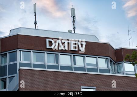 Nuremberg, Germany - August 18th, 2023: DATEV Logo at Streets of Nuremberg. DATEV is a german software house based in Nurmeberg, registered as coopera Stock Photo