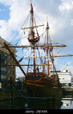 London, United Kingdom - August 02, 2005: Tourists visiting the Golden Hinde II, a replica of Sir Francis Drake's ship from 16th century. It's located Stock Photo