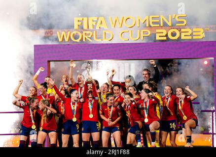 Spain's Ivana Andres lifts the FIFA Women's World Cup trophy as she celebrates with her team-mates after winning the FIFA Women's World Cup final match at Stadium Australia, Sydney. Picture date: Sunday August 20, 2023. Stock Photo