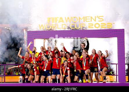 Spain's Ivana Andres lifts the FIFA Women's World Cup trophy as she celebrates with her team-mates after winning the FIFA Women's World Cup final match at Stadium Australia, Sydney. Picture date: Sunday August 20, 2023. Stock Photo