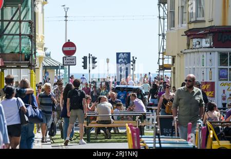 Brighton UK 20th August 2023 - Crowds enjoy the hot sunny weather on Brighton seafront as the South Coast enjoys the first nice weekend for a while  : Credit Simon Dack / Alamy Live News Stock Photo