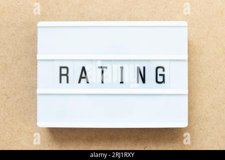 Lightbox with word rating on wood background Stock Photo