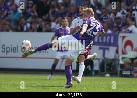 20 August 2023, Lower Saxony, Osnabrück: Soccer: 2nd Bundesliga, VfL Osnabrück - 1. FC Nürnberg, Matchday 3 at Stadion an der Bremer Brücke. Osnabrück's Niklas Wiemann plays the ball. Photo: Friso Gentsch/dpa - IMPORTANT NOTE: In accordance with the requirements of the DFL Deutsche Fußball Liga and the DFB Deutscher Fußball-Bund, it is prohibited to use or have used photographs taken in the stadium and/or of the match in the form of sequence pictures and/or video-like photo series. Stock Photo