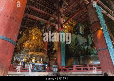 Marvelous statues in the Great Buddha Hall at the Todai-ji Temple in Nara, Japan. Stock Photo