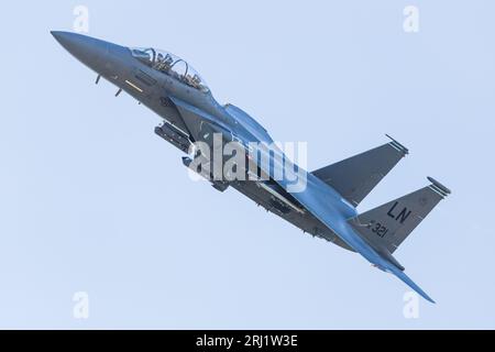 An F-15E Strike Eagle assigned to the 492nd Fighter Squadron (known as the Bolars) departs RAF Lakenheath in Suffolk in August 2023 on a training sort Stock Photo