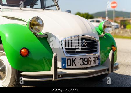 Langeac, France - May 27, 2023: Special limited edition Citroen 2CV in white and green. View of the front of the car. Stock Photo