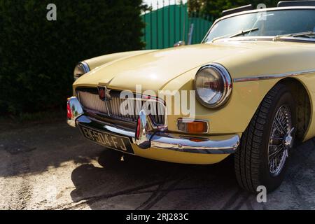 Langeac, France - May 27, 2023: Photo of vintage car Morris 1966 Morris Garage MGB Park 1 Roadster. Beige car. Stock Photo