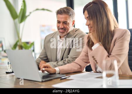 Professional business executives office team working using laptop at meeting. Stock Photo