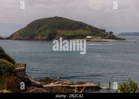 Herm, Channel Islands. 11 June 2023.  A view of Jethou Island from the Rosaire Steps, Herm at low tide. Stock Photo