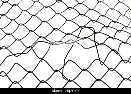 The texture of the metal mesh. Torn, destroyed, broken metal mesh on a white background Stock Photo