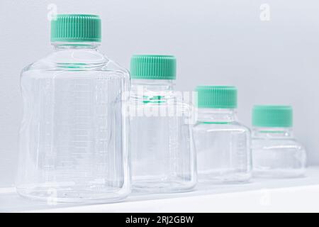 Transparent vials pharmaceuticals plastic bottles in a row Stock Photo