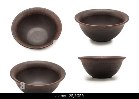 Ceramic empty brown bowl isolated on white background. Stock Photo