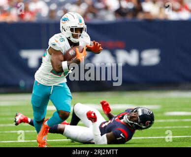 August 19, 2023: Miami Dolphins quarterback Skylar Thompson (19) fakes a  handoff to Miami Dolphins running back Salvon Ahmed (26) during a preseason  game between the Miami Dolphins and the Houston Texans