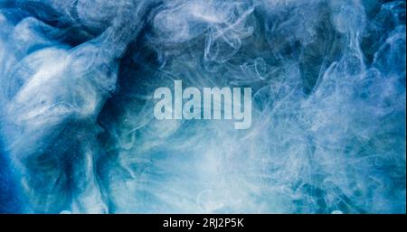 Glitter mist paint water splash blue smoke cloud Stock Photo