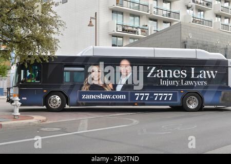 Public transport in Tucson AZ with colorful advertising wrap covering the sides and back. Stock Photo