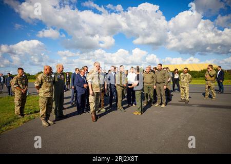 During a working visit to the Kingdom of Denmark, the President of Ukraine, Volodymyr Zelensky ,visited the Fighter Wing Skrydstrup air base of the Royal Danish Air Force.   Accompanied by Prime Minister of Denmark Mette Frederiksen and the Royal Air Force Command, the Head of State familiarized himself with the technical features of F-16 Fighting Falcon jets and the training program for Ukrainian pilots on these aircraft.  He spoke with Ukrainian pilots who are undergoing training on F-16s to protect Ukrainian skies. Stock Photo