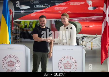 PM Mette Frederiksen in F-16. During a working visit to the Kingdom of Denmark, the President of Ukraine, Volodymyr Zelensky ,visited the Fighter Wing Skrydstrup air base of the Royal Danish Air Force.   During a working visit to the Kingdom of Denmark, the President of Ukraine, Volodymyr Zelensky ,visited the Fighter Wing Skrydstrup air base of the Royal Danish Air Force.   Accompanied by Prime Minister of Denmark Mette Frederiksen and the Royal Air Force Command, the Head of State familiarized himself with the technical features of F-16 Fighting Falcon jets and training program for Ukraine. Stock Photo