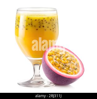 Passion fruit drink in a glass and piece of fresh maracuya fruit, isolated on white Stock Photo