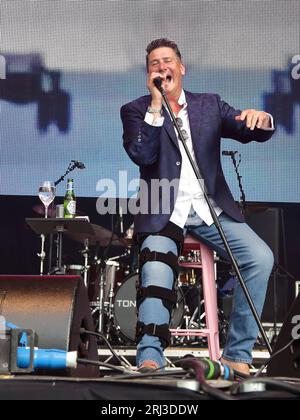 Henley-on-Thames, United Kingdom. 20th Aug, 2023. Tony Hadley at the Second day of Rewind South 80s Music Festival 2023. He performed on stage with his right leg in a walking cast. Credit: Uwe Deffner/Alamy Live News Stock Photo